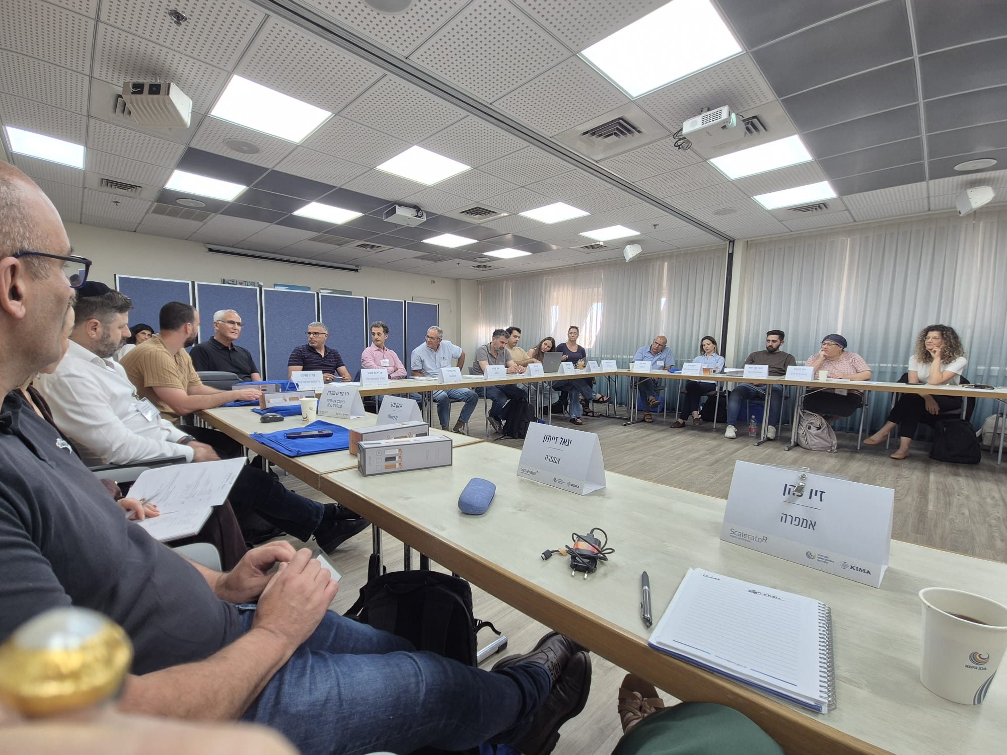 A Scalerator cohort session in progress around the table